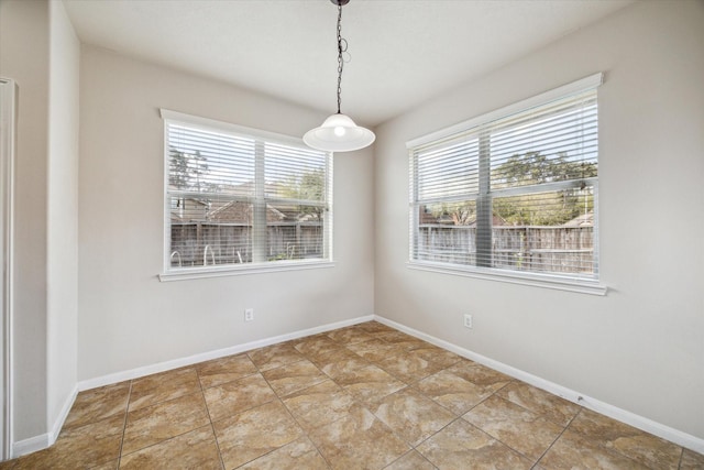 13303 Bomoseen Lake Rd, Houston, TX 77044 - unfurnished dining area featuring baseboards