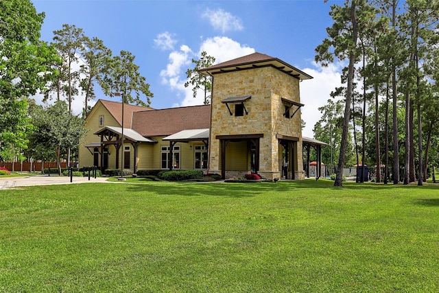 13303 Bomoseen Lake Rd, Houston, TX 77044 - view of front facade featuring stone siding and a shingled roof