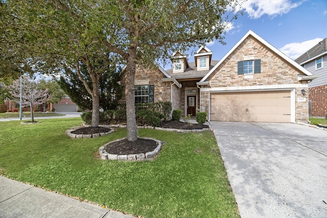 13303 Bomoseen Lake Rd, Houston, TX 77044 - view of front of house with driveway, a front yard, stone siding, and a garage