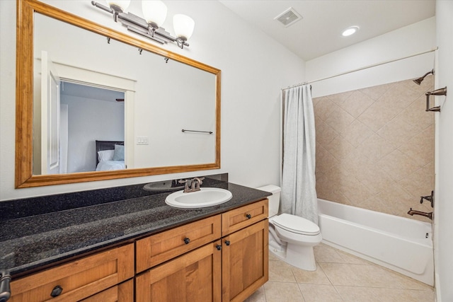 6110 Clyde St, Houston, TX 77007 - bathroom with toilet, shower / tub combo, vanity, and tile patterned floors