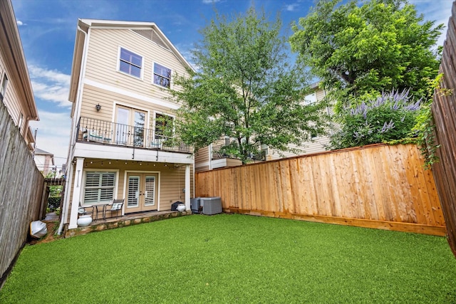 6110 Clyde St, Houston, TX 77007 - rear view of property with french doors, cooling unit, and a balcony