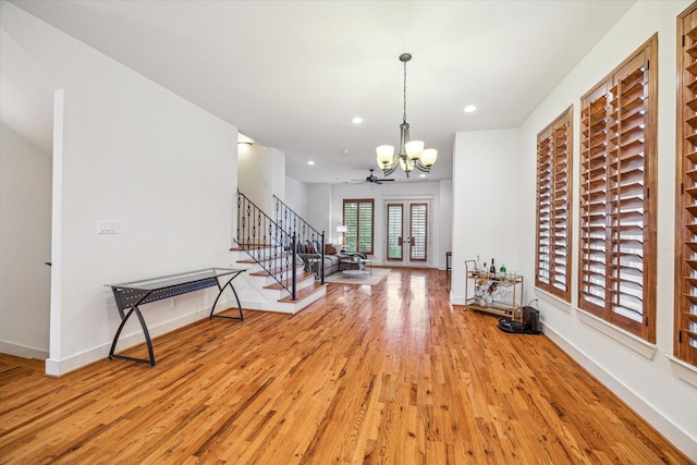 6110 Clyde St, Houston, TX 77007 - entrance foyer featuring a chandelier, stairs, light wood-style floors, baseboards, and recessed lighting