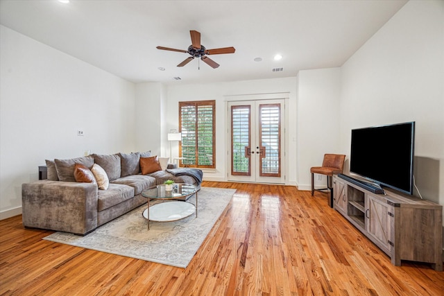 6110 Clyde St, Houston, TX 77007 - living room featuring french doors, light wood-type flooring, ceiling fan, recessed lighting, and baseboards