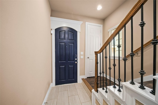 2804 Sherwin St, Houston, TX 77007 - entryway featuring baseboards, stairway, recessed lighting, and arched walkways