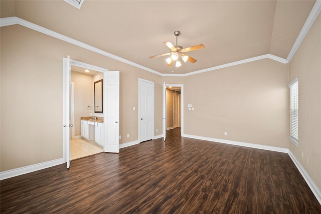 2804 Sherwin St, Houston, TX 77007 - spare room with a ceiling fan, wood finished floors, baseboards, and ornamental molding