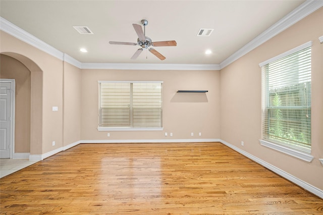 2804 Sherwin St, Houston, TX 77007 - unfurnished room with ornamental molding, ceiling fan, light wood-type flooring, arched walkways, and recessed lighting