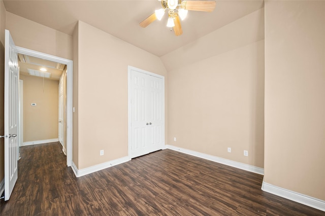 2804 Sherwin St, Houston, TX 77007 - unfurnished bedroom with attic access, dark wood-type flooring, baseboards, a closet, and vaulted ceiling