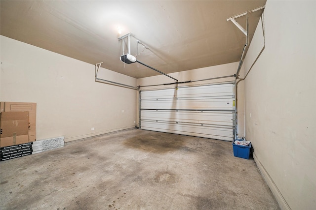 2804 Sherwin St, Houston, TX 77007 - garage with a garage door opener and baseboards