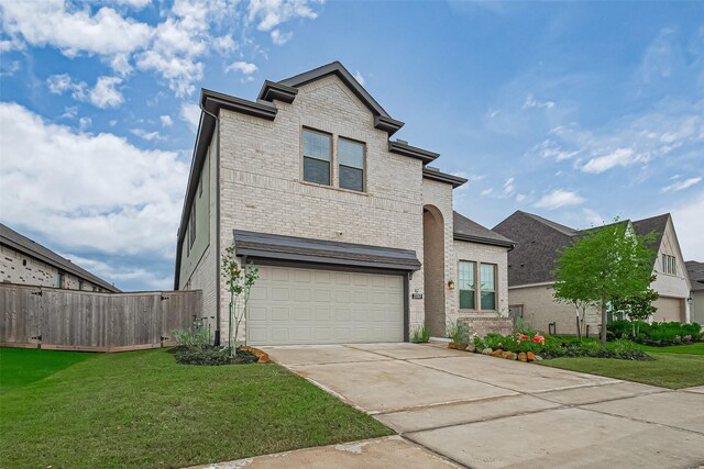 21307 Metallic Blue Dr, Cypress, TX 77433 - view of front of property with brick siding, concrete driveway, and an attached garage