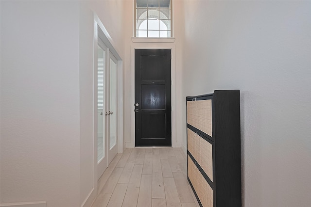 21307 Metallic Blue Dr, Cypress, TX 77433 - entrance foyer with light wood-style flooring
