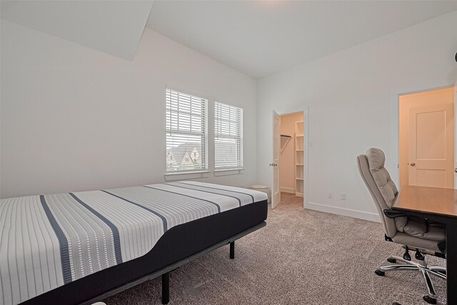 21307 Metallic Blue Dr, Cypress, TX 77433 - carpeted bedroom with a spacious closet, an office area, and baseboards