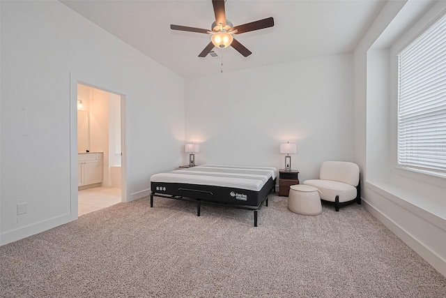21307 Metallic Blue Dr, Cypress, TX 77433 - bedroom featuring carpet, multiple windows, baseboards, and ensuite bathroom