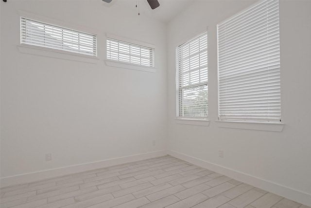 21307 Metallic Blue Dr, Cypress, TX 77433 - spare room with a ceiling fan, plenty of natural light, and baseboards