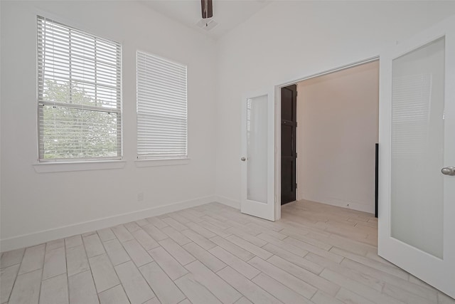 21307 Metallic Blue Dr, Cypress, TX 77433 - empty room with a ceiling fan and baseboards