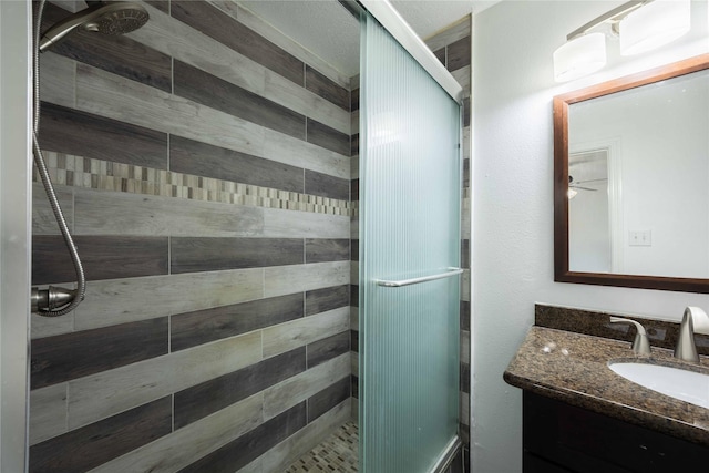 1405 Saulnier St, Houston, TX 77019 - bathroom with a shower stall and vanity