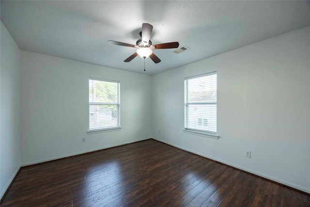 1405 Saulnier St, Houston, TX 77019 - empty room with dark wood-type flooring and ceiling fan