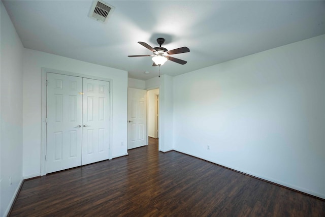 1405 Saulnier St, Houston, TX 77019 - unfurnished bedroom with dark wood finished floors, a closet, and ceiling fan