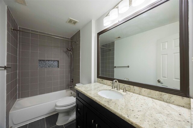 1405 Saulnier St, Houston, TX 77019 - bathroom featuring vanity and tub / shower combination