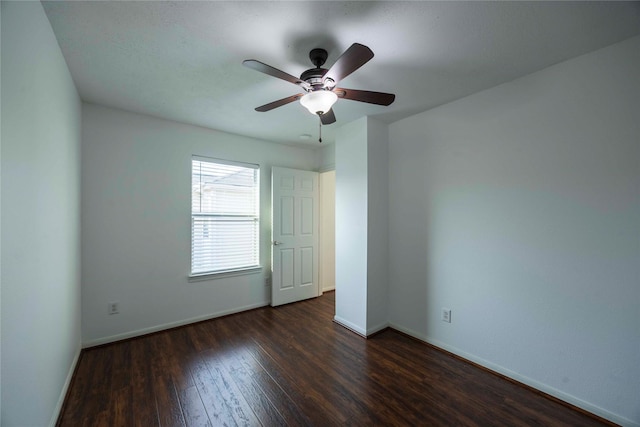 1405 Saulnier St, Houston, TX 77019 - empty room featuring dark wood-type flooring and a ceiling fan