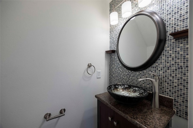 1405 Saulnier St, Houston, TX 77019 - bathroom with decorative backsplash and vanity