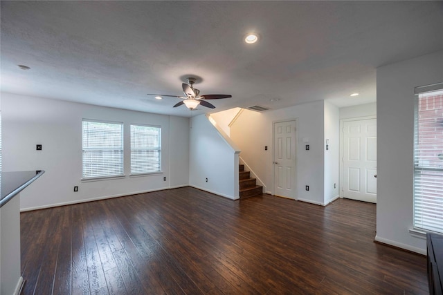 1405 Saulnier St, Houston, TX 77019 - unfurnished living room featuring a ceiling fan, dark wood finished floors, recessed lighting, and stairway