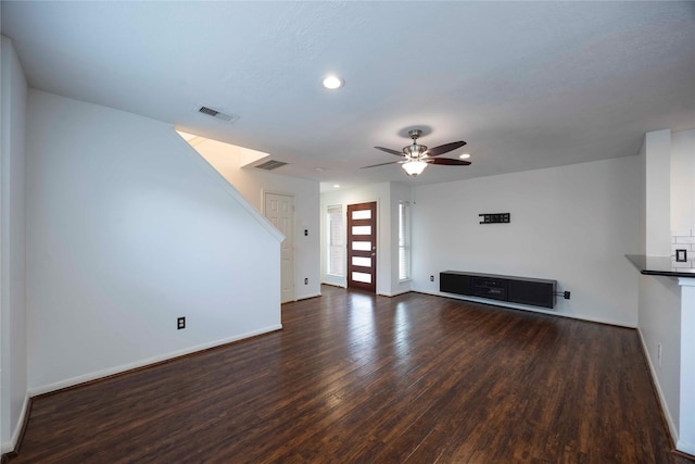 1405 Saulnier St, Houston, TX 77019 - unfurnished living room featuring wood finished floors, a ceiling fan, and recessed lighting