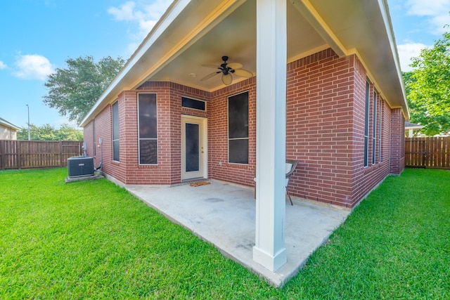 5226 Englewood Point Ct, Katy, TX 77494 - rear view of house with a ceiling fan, brick siding, a patio, and central AC