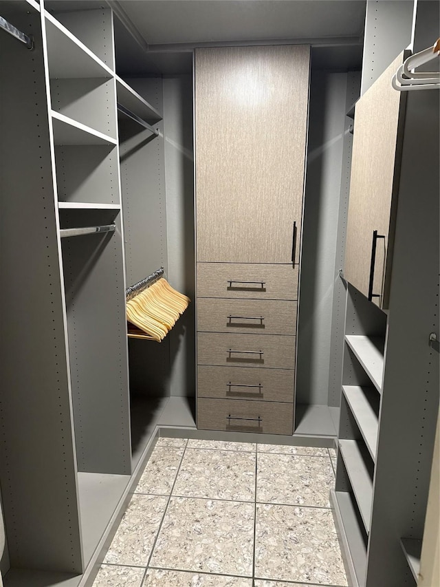 12660 Hillcrest Rd Unit 2203, Dallas, TX 75230 - spacious closet with tile patterned flooring