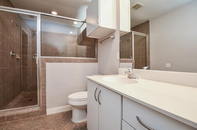 6935 Yellowstone Way Dr, Houston, TX 77054 - full bathroom featuring vanity, toilet, a shower stall, recessed lighting, and tile patterned flooring