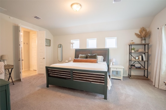 16935 Lagos Ln, Crosby, TX 77532 - bedroom featuring light colored carpet, vaulted ceiling, and baseboards
