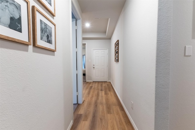 16935 Lagos Ln, Crosby, TX 77532 - hallway with light wood finished floors, baseboards, and recessed lighting