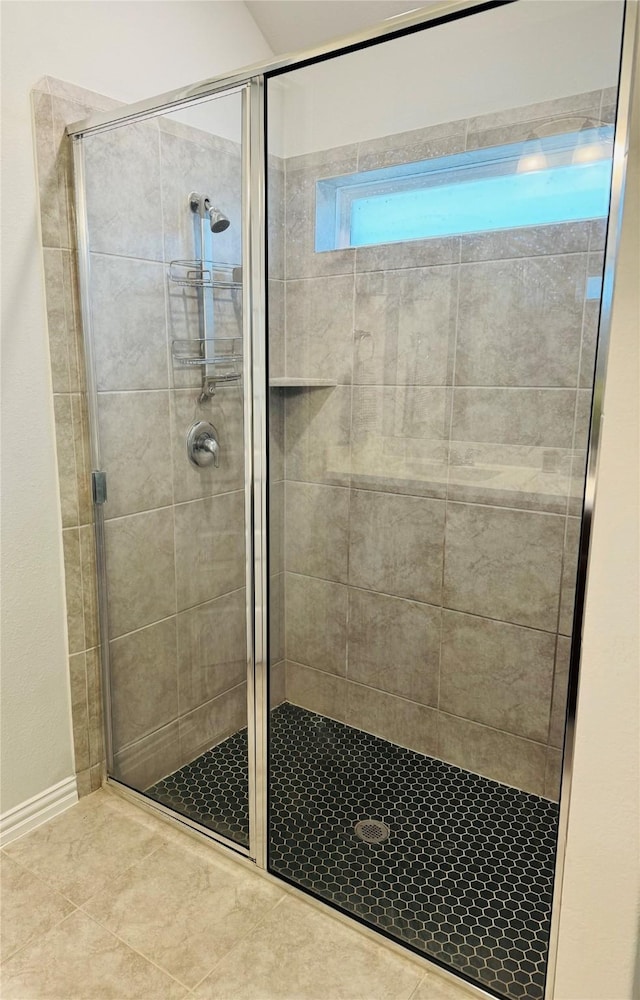 16935 Lagos Ln, Crosby, TX 77532 - bathroom featuring a shower stall and tile patterned flooring