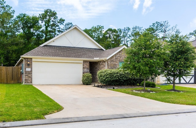 16935 Lagos Ln, Crosby, TX 77532 - view of front of property featuring brick siding, a garage, concrete driveway, and a shingled roof