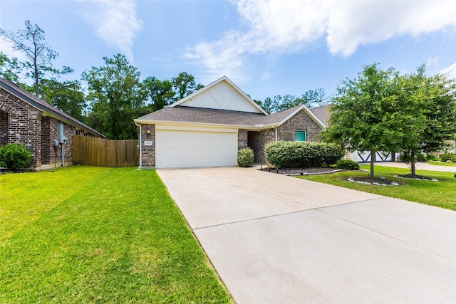 16935 Lagos Ln, Crosby, TX 77532 - view of front of house featuring an attached garage, concrete driveway, and brick siding