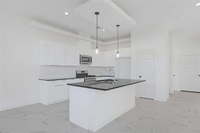 2931 El Fenice Ln, Houston, TX 77057 - kitchen with appliances with stainless steel finishes, dark countertops, light marble finish floors, a sink, and recessed lighting