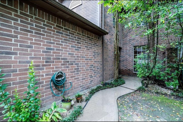 134 Willowwood Cir, The Woodlands, TX 77381 - view of side of home featuring brick siding