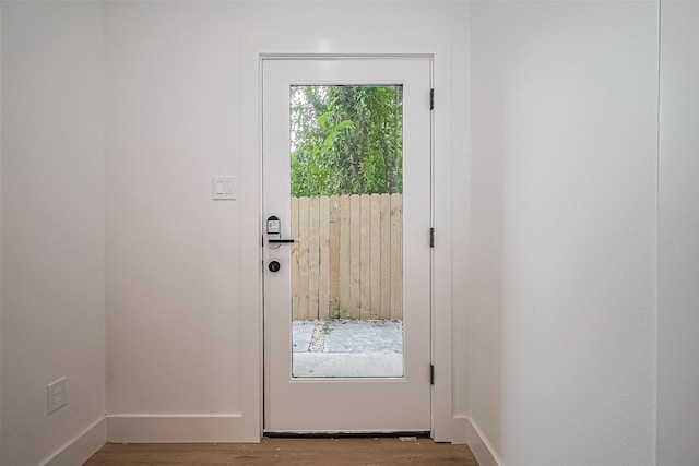 6023 Maybell, Houston, TX 77091 - doorway to outside with wood finished floors and baseboards