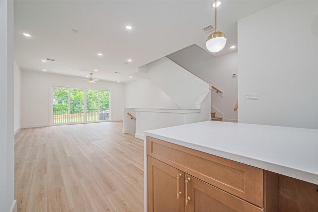 6023 Maybell, Houston, TX 77091 - kitchen with light wood-style floors, a ceiling fan, open floor plan, recessed lighting, and light countertops