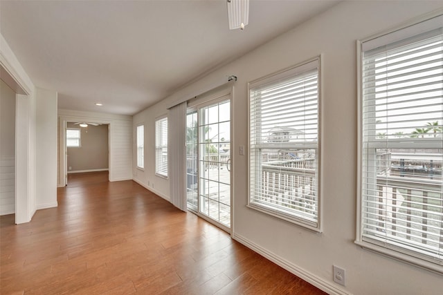 1302 Tiki Dr, Tiki Island, TX 77554 - unfurnished room with wood finished floors and baseboards