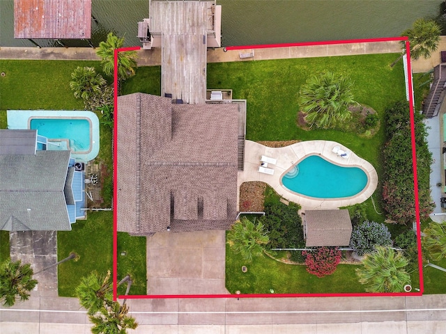 1302 Tiki Dr, Tiki Island, TX 77554 - view of property location with a pool and property parcel outlined