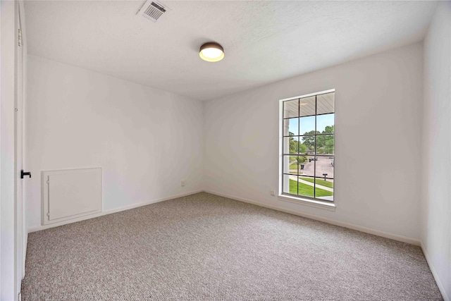 5427 Alba Rd, Houston, TX 77091 - spare room featuring carpet floors and baseboards
