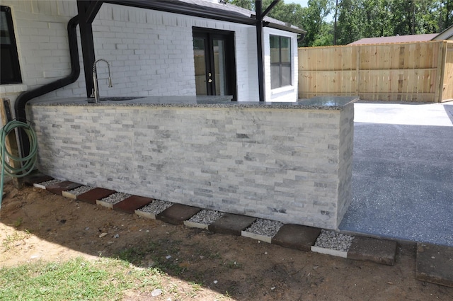 2522 Cassius Ct, New Caney, TX 77357 - view of patio featuring a sink