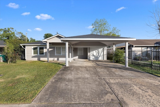 2408 Raymond St, Pasadena, TX 77506 - ranch-style home with driveway and a carport