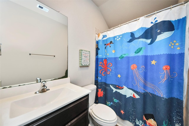 14133 Sharktooth Hill Ln, Conroe, TX 77384 - full bathroom featuring toilet, vanity, vaulted ceiling, and a shower with shower curtain