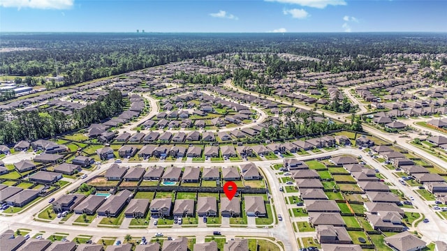 14133 Sharktooth Hill Ln, Conroe, TX 77384 - aerial view of property's location featuring nearby suburban area and a heavily wooded area