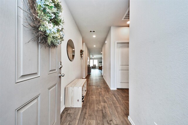 14133 Sharktooth Hill Ln, Conroe, TX 77384 - hallway with wood finished floors, baseboards, and recessed lighting