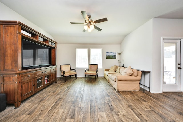 14133 Sharktooth Hill Ln, Conroe, TX 77384 - living area featuring wood finished floors, a ceiling fan, baseboards, and vaulted ceiling