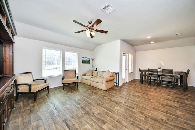 14133 Sharktooth Hill Ln, Conroe, TX 77384 - living room featuring lofted ceiling, ceiling fan, plenty of natural light, wood finished floors, and baseboards