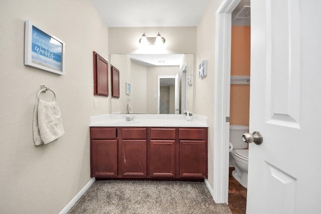 15543 Sheldon Ridge Way, Houston, TX 77044 - bathroom with toilet, double vanity, and baseboards