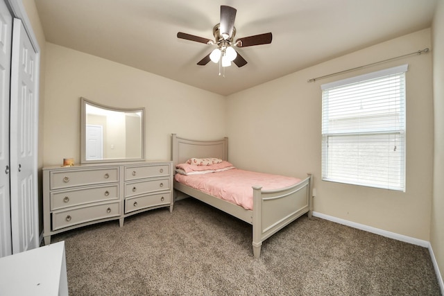 15543 Sheldon Ridge Way, Houston, TX 77044 - carpeted bedroom with a closet, baseboards, and a ceiling fan